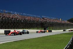 Sebastian Vettel, Ferrari SF70H leads at the start of the race