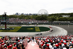 Lewis Hamilton, Mercedes AMG F1 W09, leads Daniel Ricciardo, Red Bull Racing RB14, and Kimi Raikkone