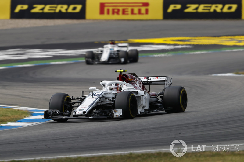 Charles Leclerc, Sauber C37, leads Marcus Ericsson, Sauber C37