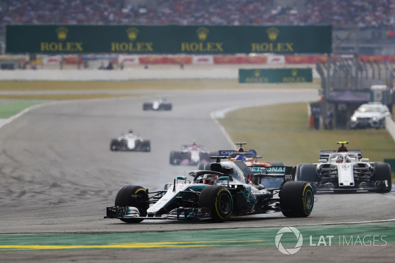 Lewis Hamilton, Mercedes AMG F1 W09, leads Charles Leclerc, Sauber C37