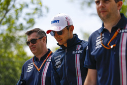 Esteban Ocon, Force India, walks the track with colleagues