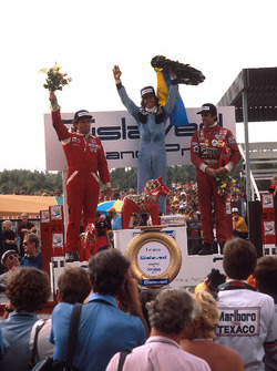 Podium : Le vainqueur Jacques Laffite, Ligier, en seconde place, Jochen Mass, McLaren, et en troisième place, Carlos Reutemann, Ferrari