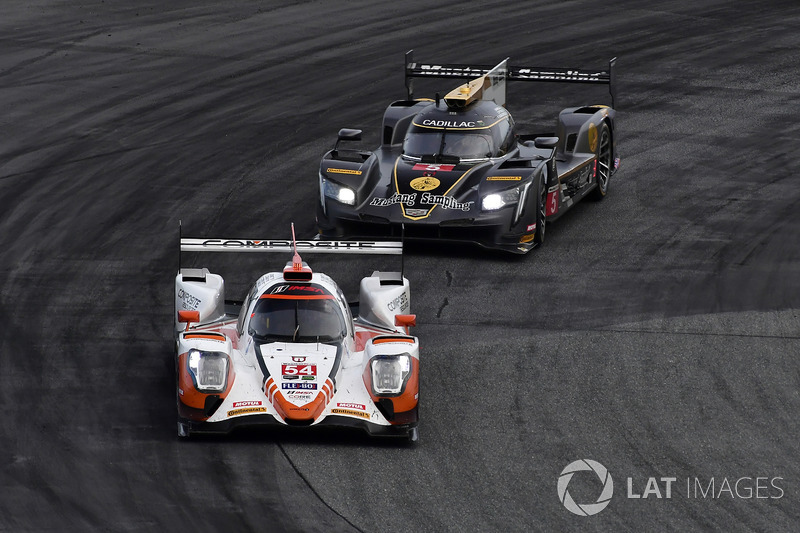 #54 CORE autosport ORECA LMP2, P: Jon Bennett, Colin Braun, Romain Dumas, Loic Duval, #5 Action Express Racing Cadillac DPi, P: Joao Barbosa, Christian Fittipaldi, Filipe Albuquerque