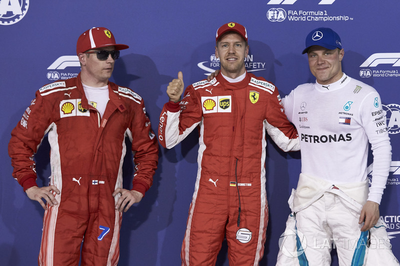 Sıralama turları ilk üç: Sebastian Vettel, Ferrari, Kimi Raikkonen, Ferrari, Valtteri Bottas, Mercedes AMG F1