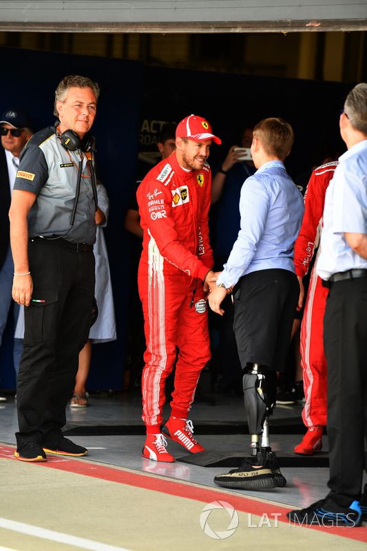 Sebastian Vettel, Ferrari with Billy Monger, in parc ferme