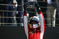 Race winner Sebastian Vettel, Ferrari, celebrates in Parc Ferme