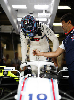 Lance Stroll, Williams Racing, enters his cockpit