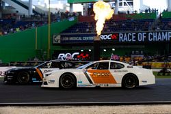 David Coulthard, races Kurt Busch, driving the Whelen NASCAR