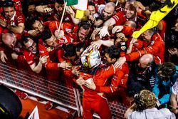 Race winner Sebastian Vettel, Ferrari, celebrates with his team in Parc Ferme