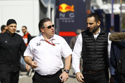 Zak Brown, Executive Director of McLaren Technology Grou, talks to Cyril Abiteboul, Managing Director, Renault Sport F1 Team Sport F1, in the paddock