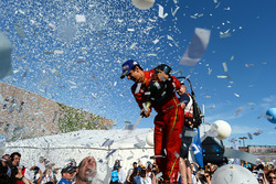 Lucas di Grassi, ABT Schaeffler Audi Sport, sprays the champagne on the podium