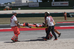 Chaz Davies, Ducati Team being taken away on a stretcher