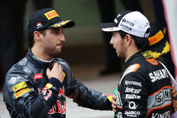 (L to R): Daniel Ricciardo, Red Bull Racing with Sergio Perez, Sahara Force India F1 at the podium