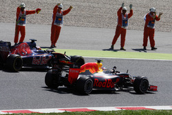 Race winner Max Verstappen, Red Bull Racing RB12 celebrates at the end of the race alongside the driver he replaced Daniil Kvyat, Scuderia Toro Rosso STR11