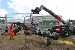 The McLaren MP4-31 of Fernando Alonso, McLaren is removed from the gravel trap after his race stoppi