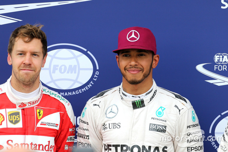 Sebastian Vettel, Scuderia Ferrari and Lewis Hamilton, Mercedes AMG F1 Team