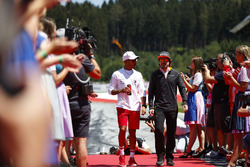 Lewis Hamilton, Mercedes AMG F1, and Fernando Alonso, McLaren, in the drivers parade