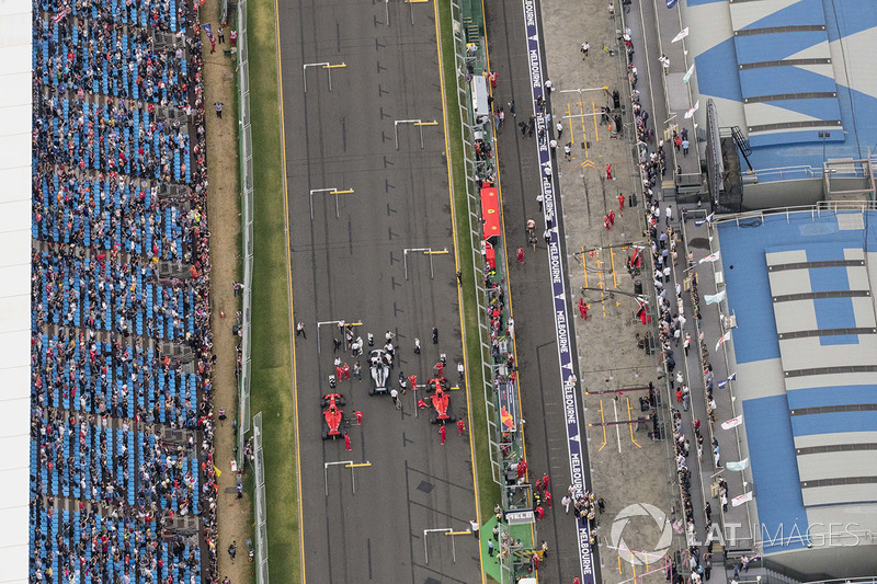 Top three qualifiers Lewis Hamilton, Mercedes AMG F1 W09, Sebastian Vettel, Ferrari SF71H, and Kimi Raikkonen, Ferrari SF71H, on the main straight after the Qualifying session