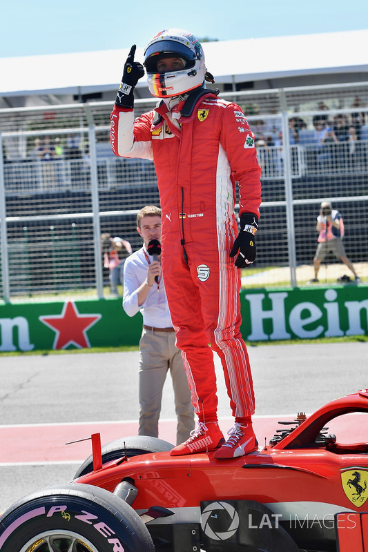 Pole sitter Sebastian Vettel, Ferrari celebrates in parc ferme