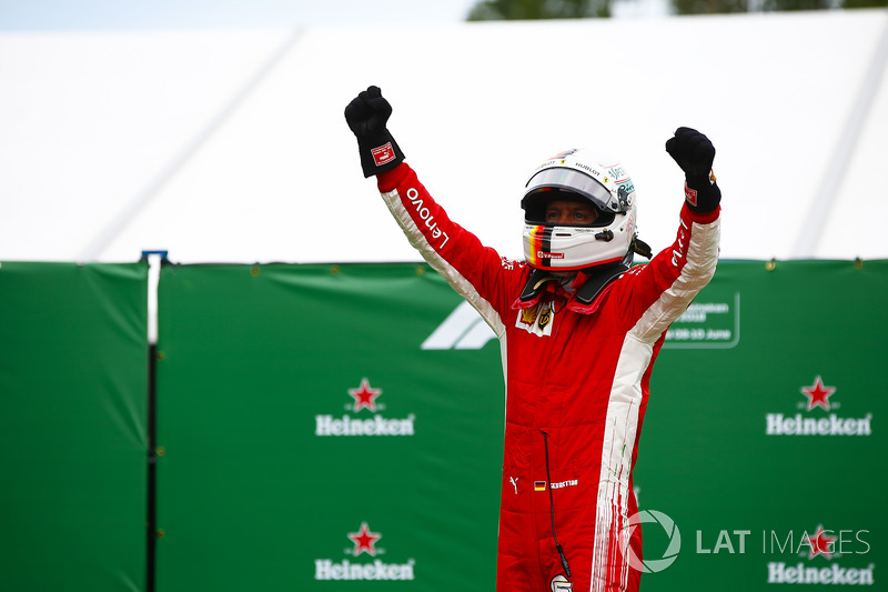 Sebastian Vettel, Ferrari, celebrates victory in parc ferme