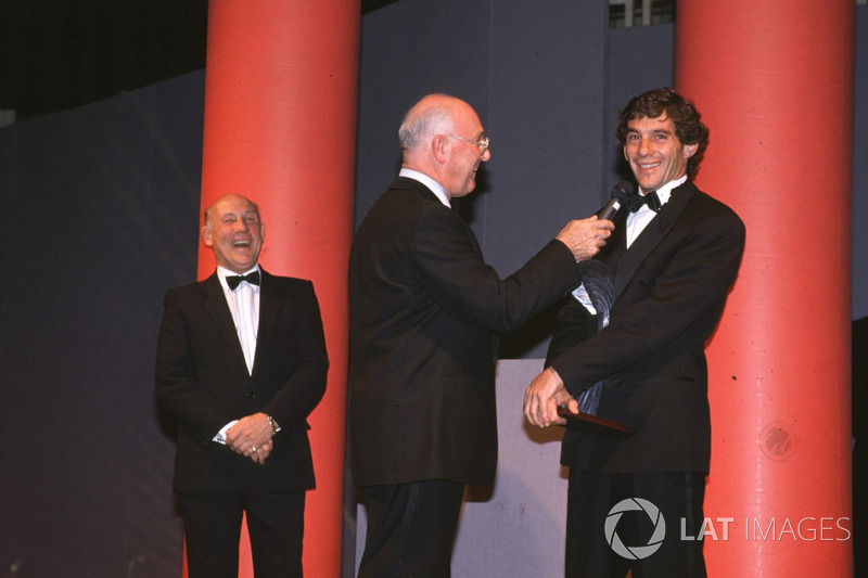 Ayrton Senna receives his award from Murray Walker