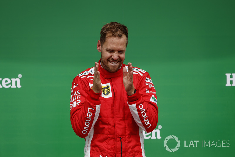Sebastian Vettel, Ferrari, 1st position, on the podium