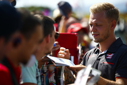 Kevin Magnussen, Haas F1 Team, signs autographs and has his picture taken by fans