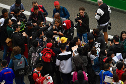 Lewis Hamilton, Mercedes-AMG F1 signs autographs for the fans