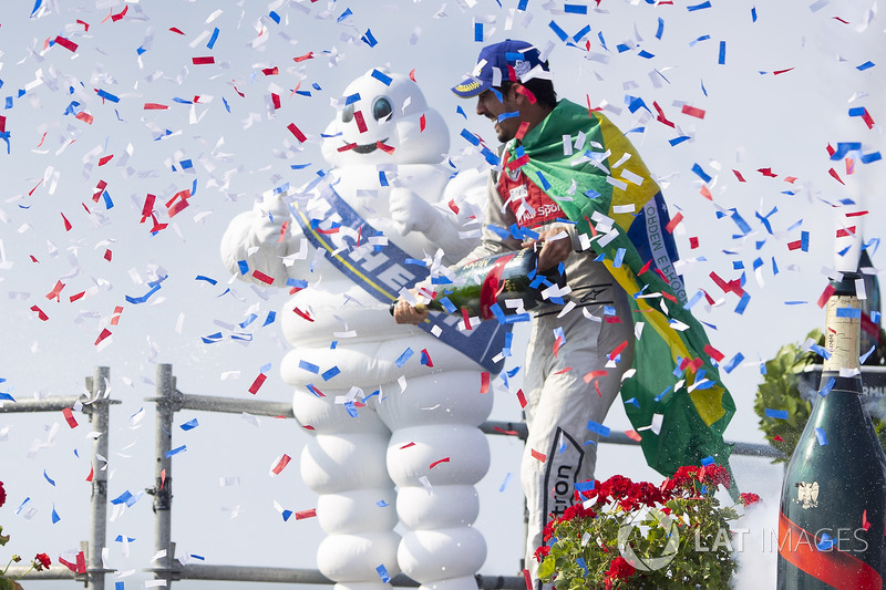 Lucas di Grassi, Audi Sport ABT Schaeffler, celebrates on the podium after winning the race