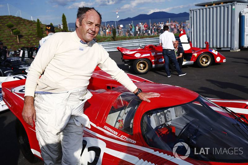 Gerhard Berger poses, a 1970 Porsche 917