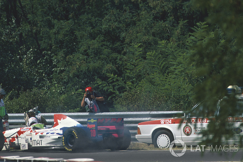 Taki Inoue, Arrows FA16 is knocked down by a medical car after trying to put out a fire