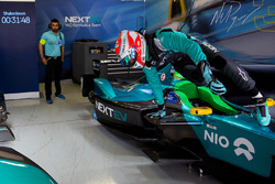 Nelson Piquet Jr., NEXTEV TCR Formula E Team, jumps from his car in the garage