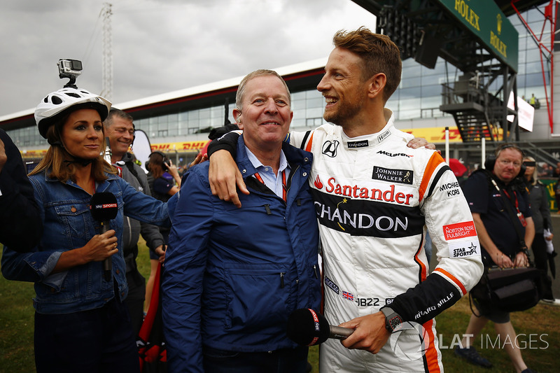 Jenson Button, McLaren, greets Sky pundit Martin Brundle