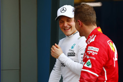 Valtteri Bottas, Mercedes AMG, with Sebastian Vettel, Ferrari