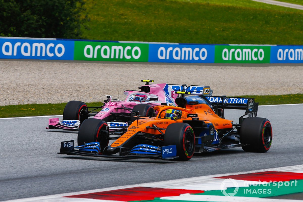 Lando Norris, McLaren MCL35, precede Lance Stroll, Racing Point RP20