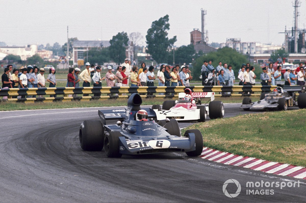Jackie Stewart, Tyrrell 005 Ford, leads Clay Regazzoni, BRM P160D and Emerson Fittipaldi, Lotus 72D