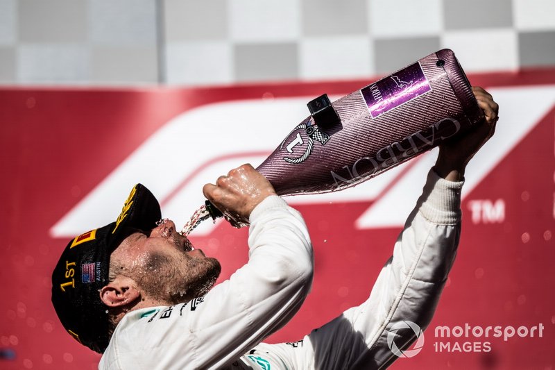 Valtteri Bottas, Mercedes AMG F1, 1st position, drinks Champagne on the podium