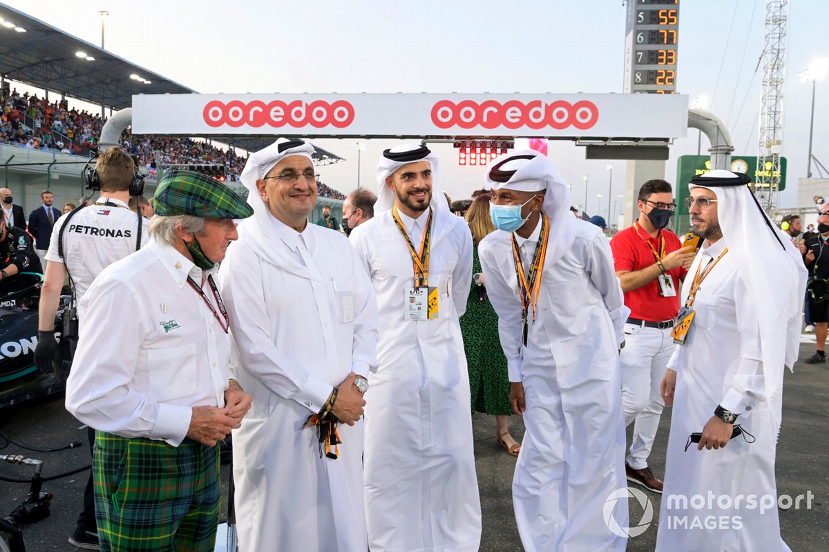 Sir Jackie Stewart on the grid with dignitaries