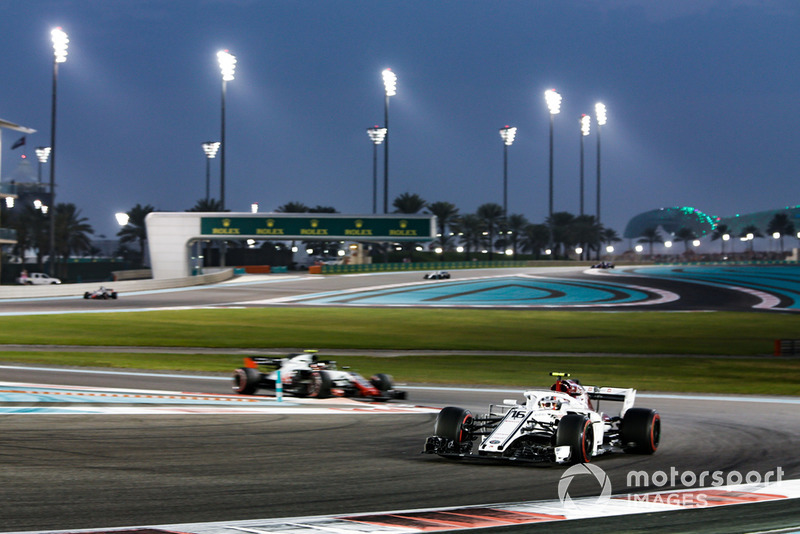 Charles Leclerc, Sauber C37 leads Kevin Magnussen, Haas F1 Team VF-18
