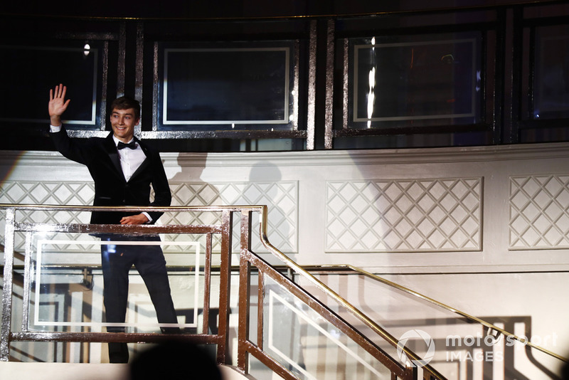 FIA F2 Champion George Russell enters the room