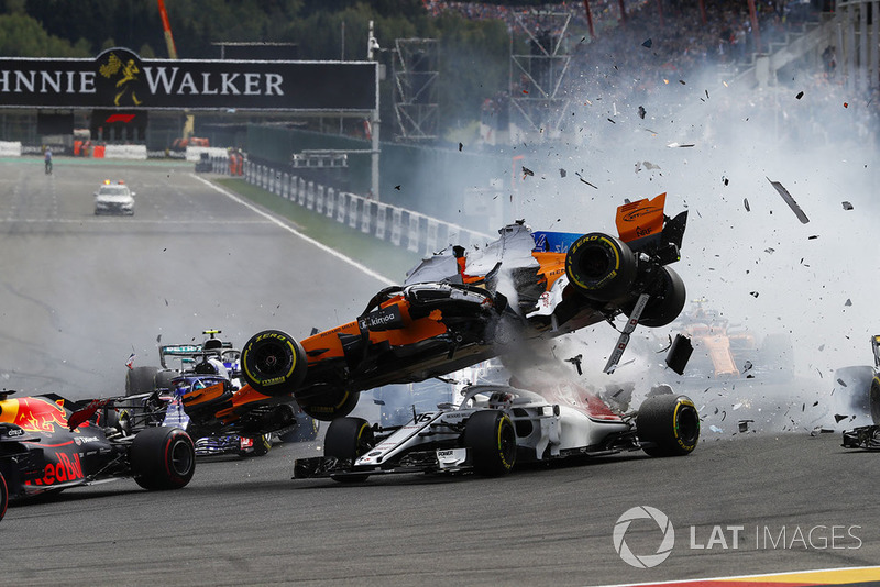 Fernando Alonso, McLaren MCL33, crashes over Charles Leclerc, Sauber C37, after contact from Nico Hulkenberg, Renault Sport F1 Team R.S. 18, at the start