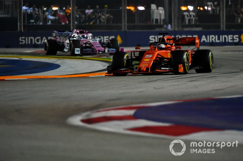 Sebastian Vettel, Ferrari SF90, leads Sergio Perez, Racing Point RP19