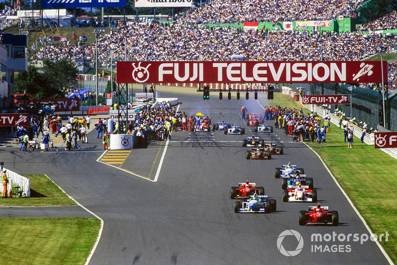 Michael Schumacher, Ferrari, David Coulthard, McLaren, al GP del Giappone del 1996
