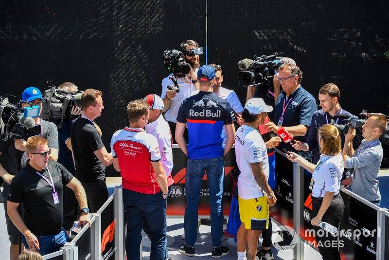 Kimi Raikkonen, Alfa Romeo Racing, Daniil Kvyat, Toro Rosso and Lewis Hamilton, Mercedes AMG F1 speak to the media