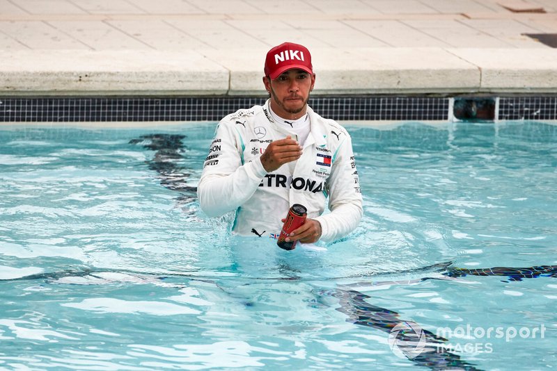 Lewis Hamilton, Mercedes AMG F1, 1st position, in the swimming pool after the race