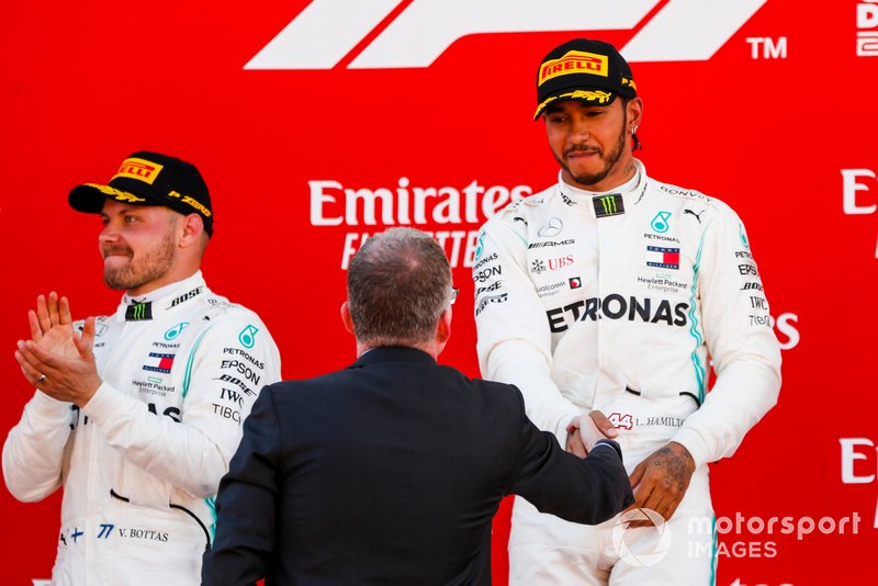 Lewis Hamilton, Mercedes AMG F1, 1st position, receives his trophy