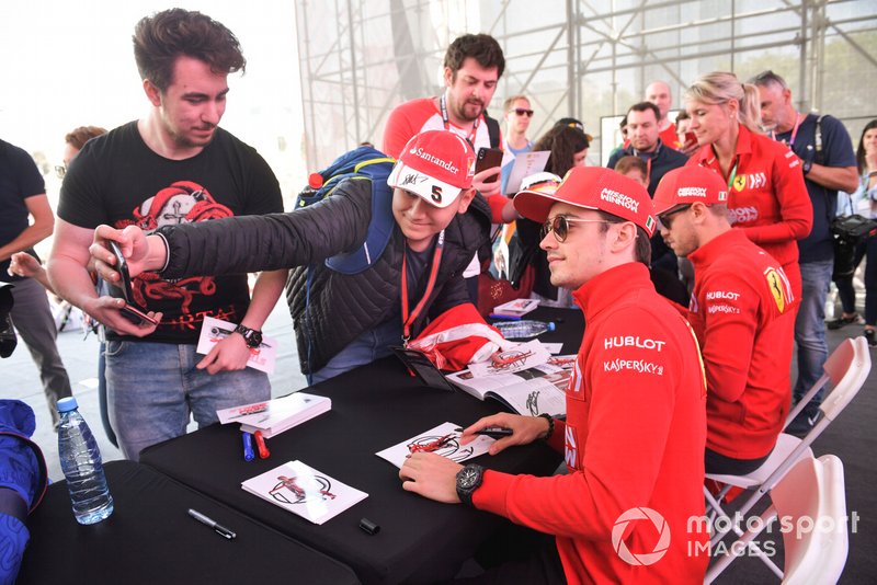 Sebastian Vettel, Ferrari and Charles Leclerc, Ferrari sign autographs for fans