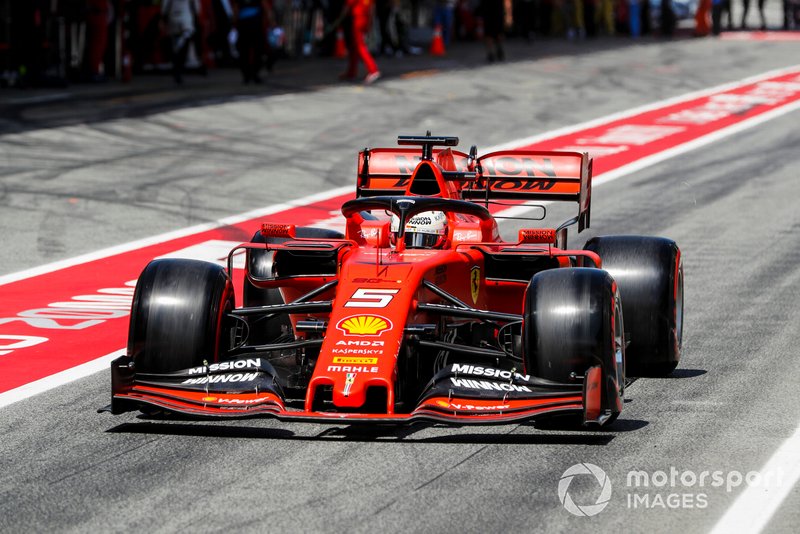 Sebastian Vettel, Ferrari SF90, in the pit lane