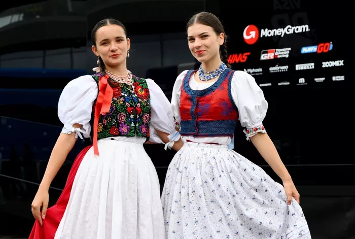 Traditional costume in the Paddock prior to the F1 Grand Prix of Hungary.
