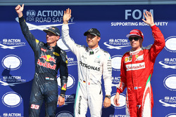 Qualifying top three in parc ferme (L to R): Max Verstappen, Red Bull Racing, second; Nico Rosberg,